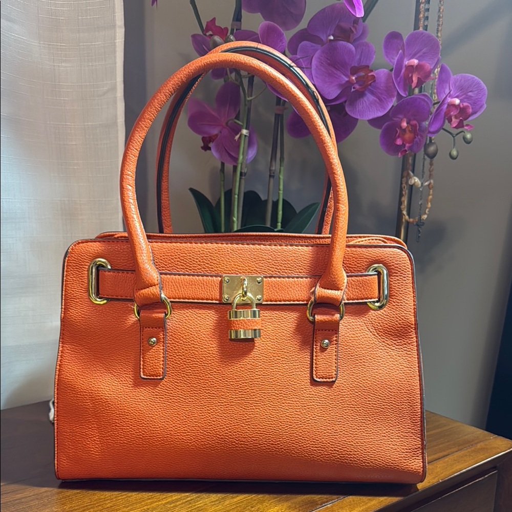 Orange Vegan Leather Handbag with lock detail